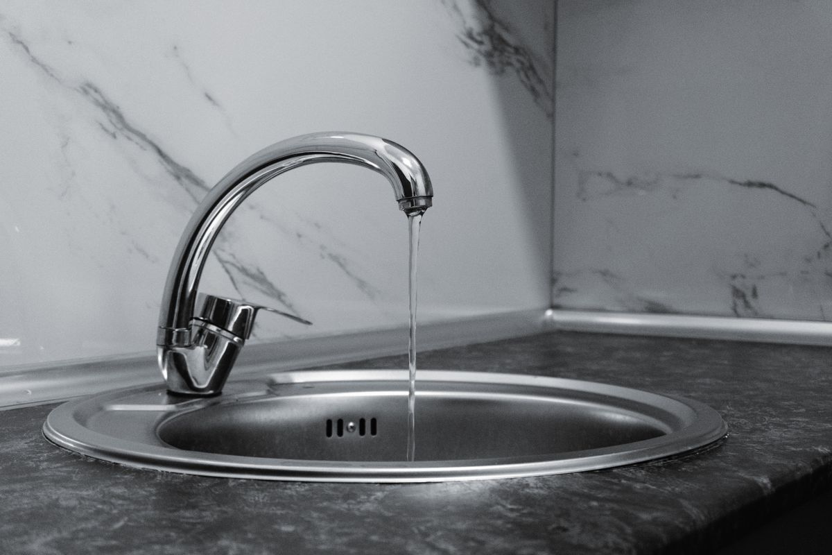 Chrome kitchen faucet delivering well-maintained, high-quality treated water