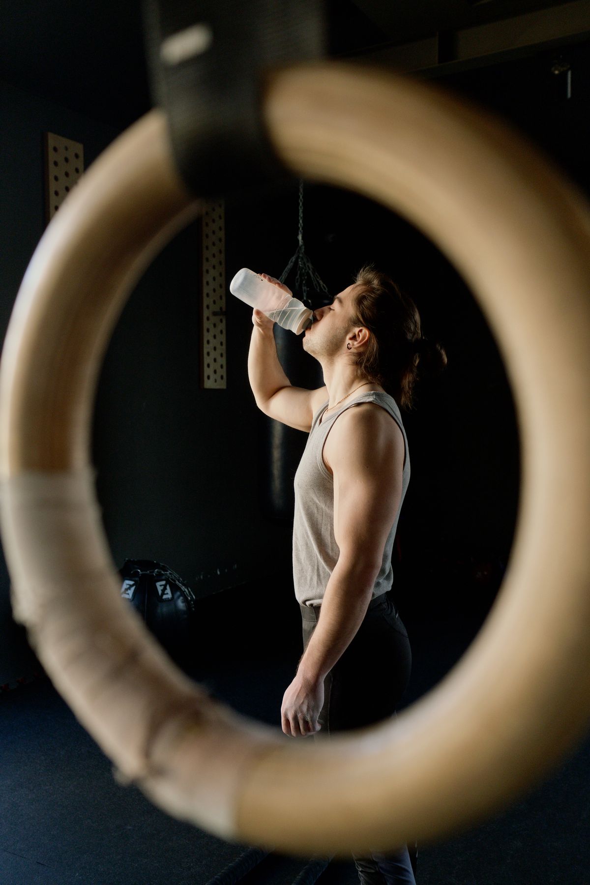 Man drinking clean, treated water after a workout