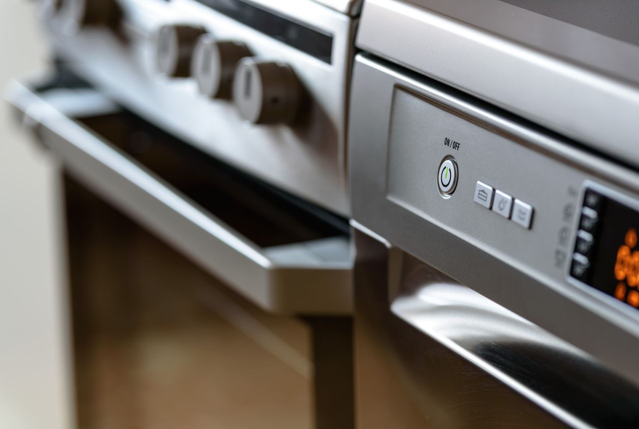 A sleek stainless-steel kitchen appliance — soft water keeps scale out so appliances last longer
