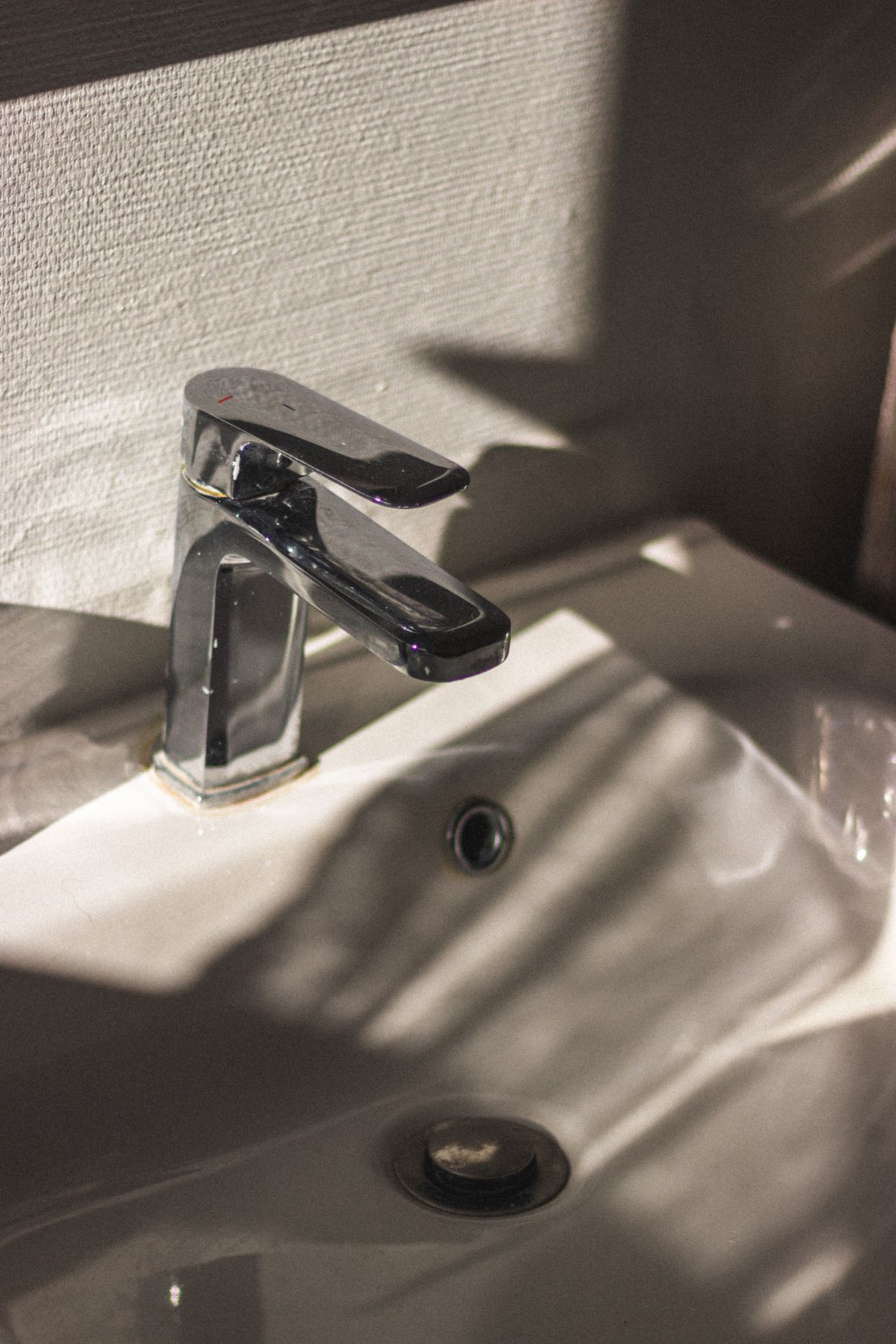 Sunlit faucet free of hard-water scale buildup thanks to a softener
