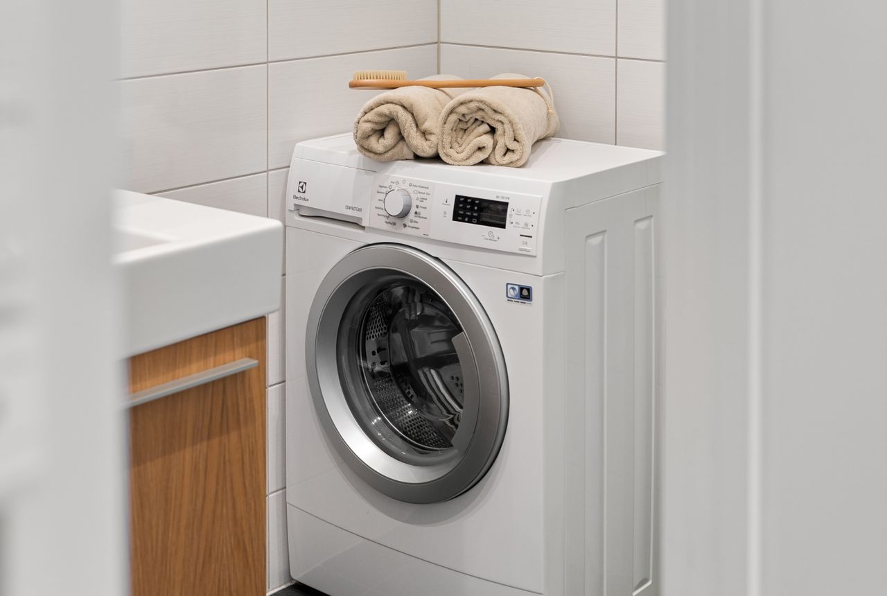 A home washing machine — iron- and H₂S-free water helps appliances run better and last longer